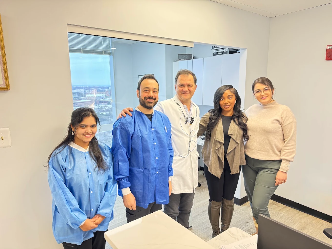 Dr. Karbasi with the Reston Heights Dental team